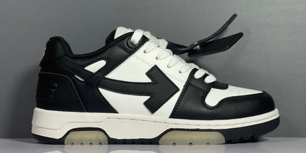 Black and white off-white arrow daddy sneakers with bold arrow logo made of leather and rubber materials