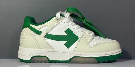 White and green off-white arrow daddy sneakers with a bold arrow logo on the side for 2023 trends