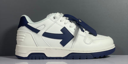 White and navy blue off-white arrow daddy sneakers with bold arrow logo on side in 2023 trend design