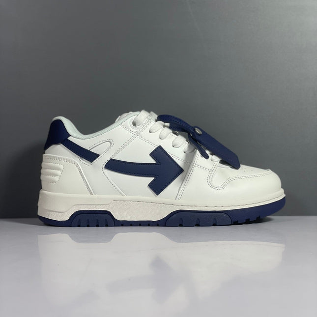 White and navy blue off-white arrow daddy sneakers with bold arrow logo on side in 2023 trend design