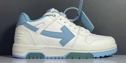 White and light blue off-white arrow daddy sneakers featuring a prominent arrow logo on the side in 2023 trend style