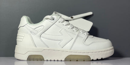 White leather off-white arrow daddy sneakers with bold black arrow logo and translucent beige rubber soles