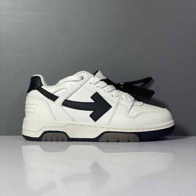 White leather off-white arrow daddy sneakers with black arrow logo matching laces and chunky sole