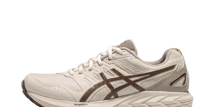 Beige running shoe with brown accents, textured sole, and mesh upper, side view.