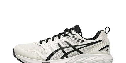 White running shoe with black accents, mesh texture, and a thick sole on a plain white background.