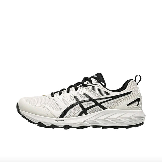 White running shoe with black accents, mesh texture, and a thick sole on a plain white background.
