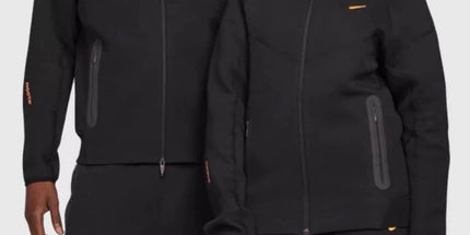Two people wearing matching black outfits with a brand logo on a white background