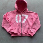 Pink top (with letters on the back)