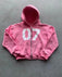 S / Pink top (with letters on the back)
