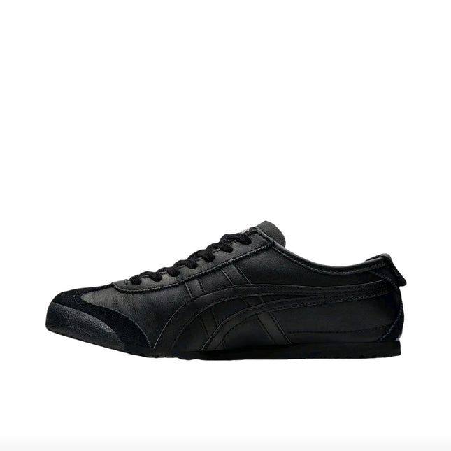 Black low-top sneaker with leather upper and textured sole, featuring subtle stitched stripes.