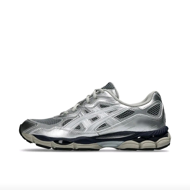 Silver athletic sneaker with mesh panels, white logo, black and gray sole on a plain white background.