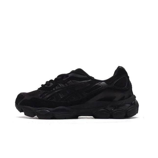Black sneaker with textured details and a chunky sole, viewed from the side on a white background.