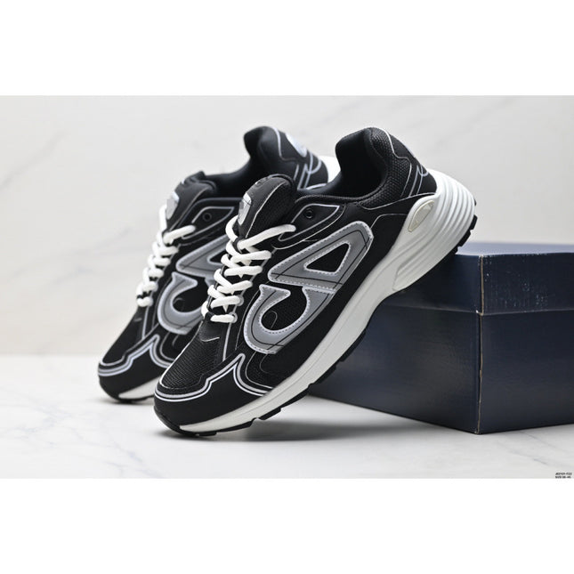 Black and white sneakers on a light gray background