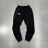 M / Black trousers
