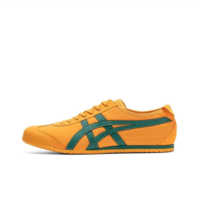 Orange sneaker with green stripes on the side, shown on a white background.