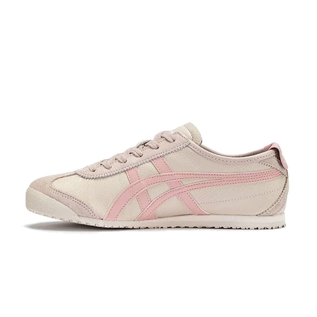 Beige sneaker with pink stripes and laces, low top, side view on white background.