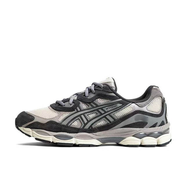 Gray and white sneaker with black accents, mesh panels, and layered sole on a white background.