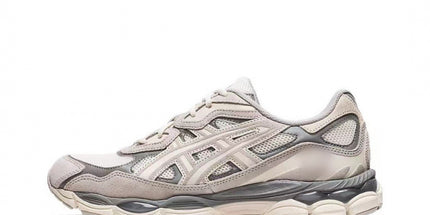 Gray and white running shoe on a white background