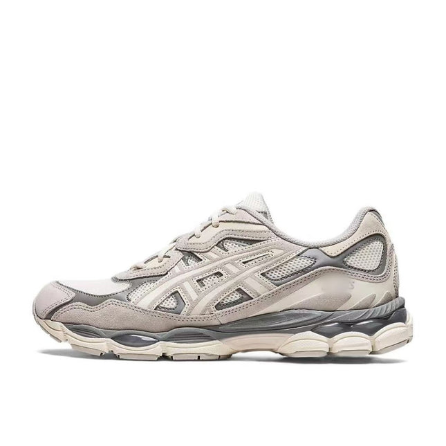 Light gray sneaker with mesh panels, beige accents, and a thick, textured sole.