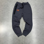 Dark grey trousers