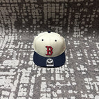 The Red Sox navy blue spells white