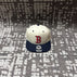The Red Sox navy blue spells white