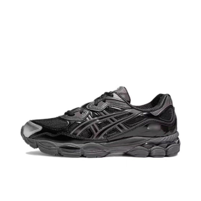 Black sneaker with glossy finish, mesh panels, and textured sole on a white background.